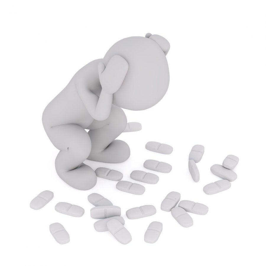3d illustration einer figur in hockender position, die nachhaltig schmerzfrei auf verstreute pillen am boden liegt.